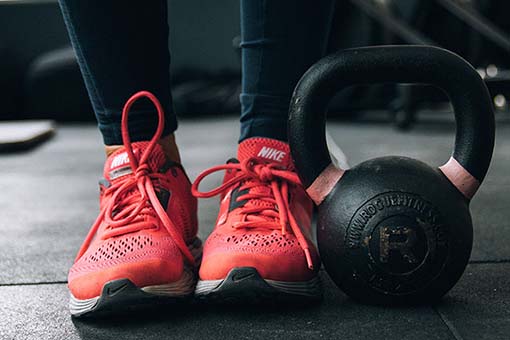 Red NIke Shoes Kettlebell Weight